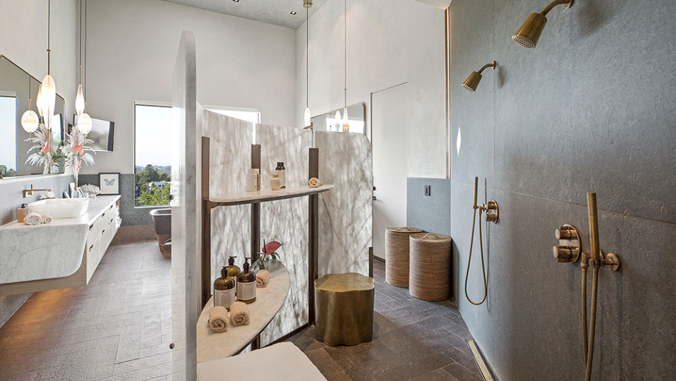 Chrissy Teigen and John Legen Beverly Hills Home Master bathroom with brass hardware and accessories